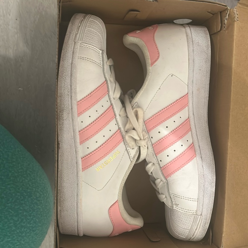 Pink and white adidas